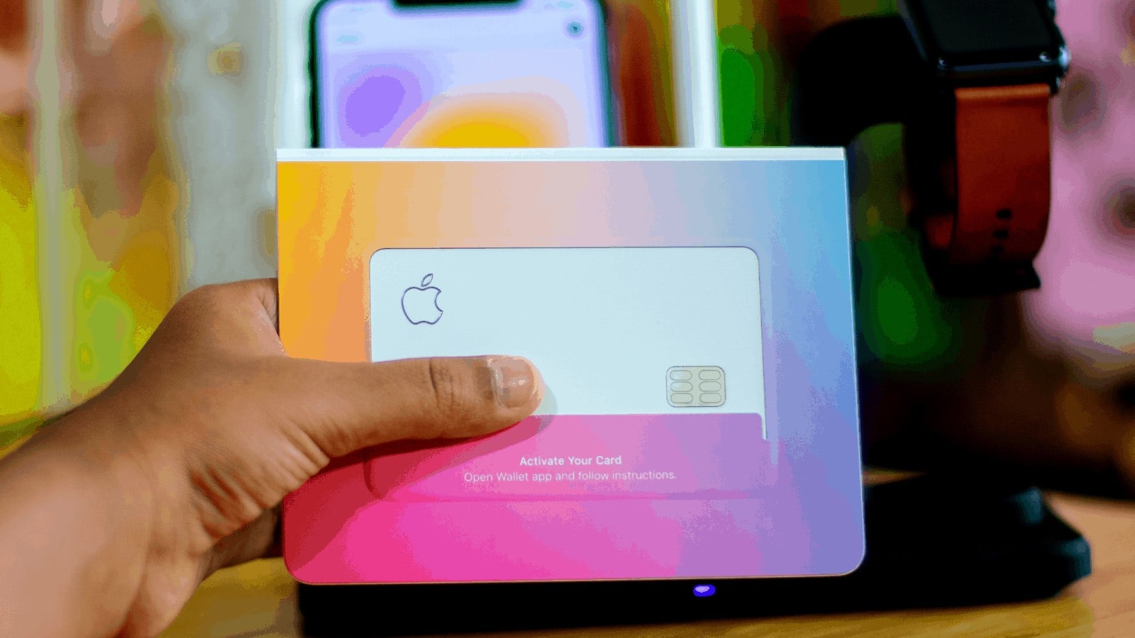 A person showing off an Apple Card, ensuring privacy and caution in the adult industry.