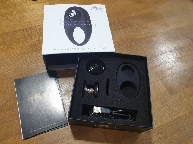 A black box with an electronic device called the Cock Cam inside.