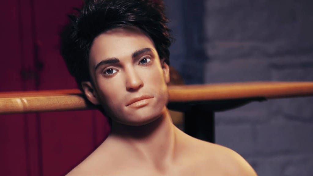 A male sex robot is leaning against a wooden bench.