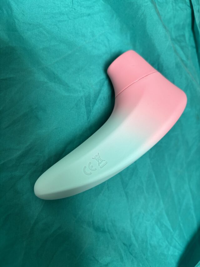 Silicone pink and white sex toy for adult pleasure, designed for intimate stimulation, with a smooth surface and ergonomic shape. Perfect for enhancing personal and couples' intimacy.