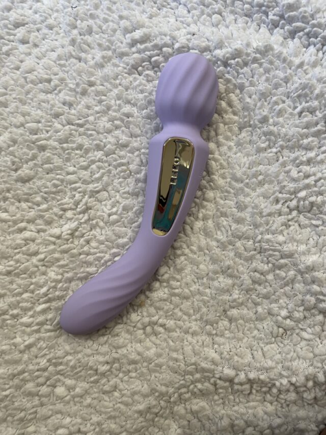 Silicone sex toy with curved design, advanced features, and sleek gold accents for enhanced pleasure and remote control functionality. Perfect for adult intimacy, pleasure enhancement, and personal wellness.