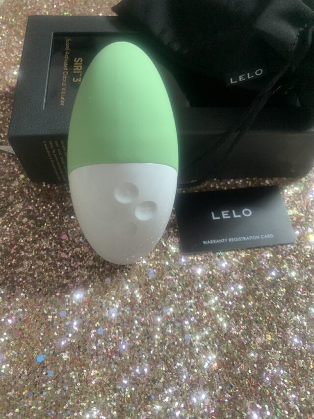 Lelo SIR3 vibrating clitoral stimulator with green and white design, rechargeable and waterproof.