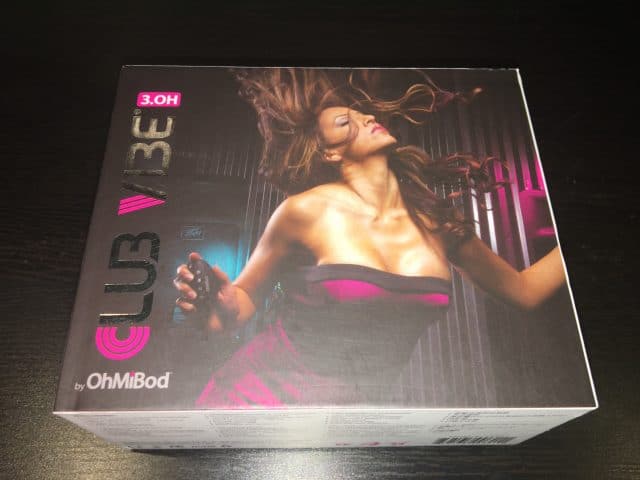 A woman in an OhMiBod Club Vibe 3.0H Panty Vibe box.