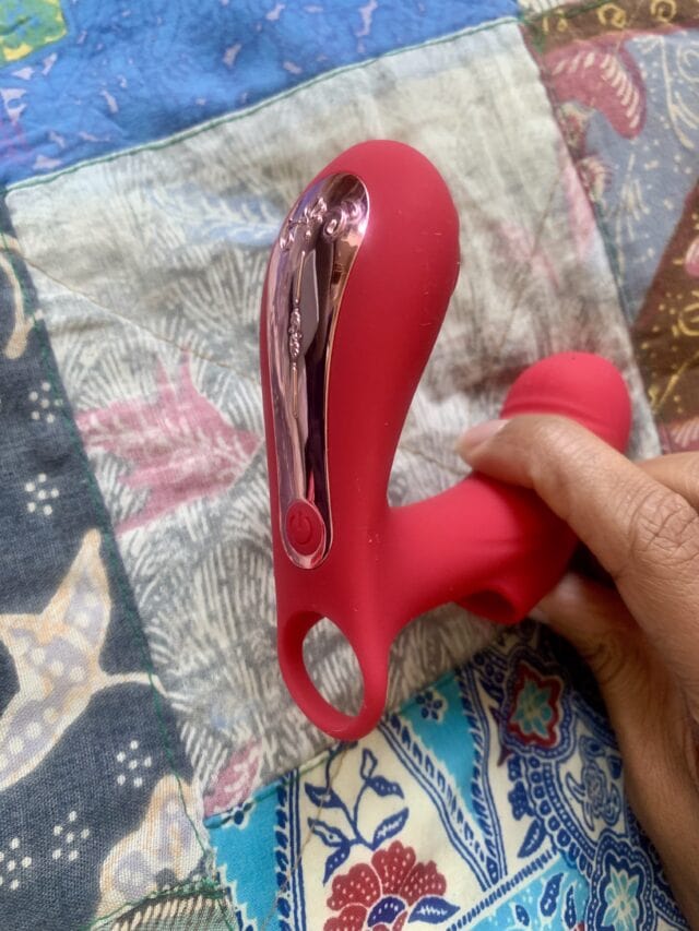 Flexible silicone clitoral vibrator with ergonomic handle and touch control button for enhanced pleasure, waterproof and rechargeable, designed for easy use and maximum intimacy.