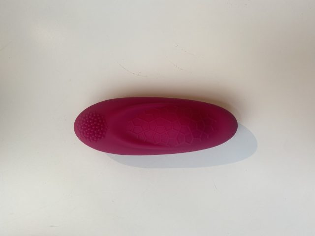 Silicone massage wand with textured surface and ergonomic design, ideal for personal pleasure and intimacy enhancement. Perfect for exploring sensuality with discreet, body-safe material.