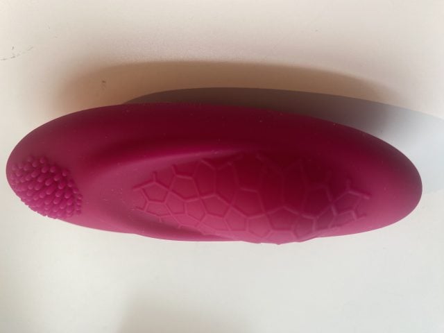 Silicone sex toy with textured surface and honeycomb design, ideal for pleasure and stimulation, perfect for adult intimate use and sexual wellness.