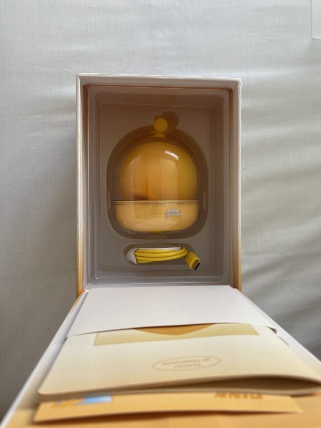 Bullet vibrator with remote control, yellow color, sex toy for women, discreet packaging, popular sextech product, innovative adult pleasure device.