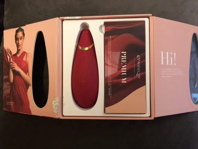 A Womanizer Pro review presenting the Womanizer Premium's red box and tampon.