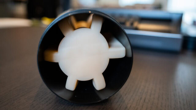 Sleek black and white 3D printed toy mold with a geometric design for innovative sextech products.