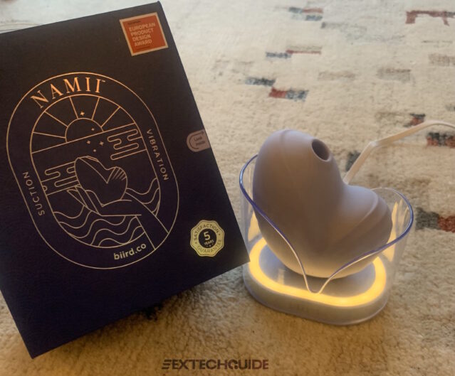 A box with a Namii device beside it.