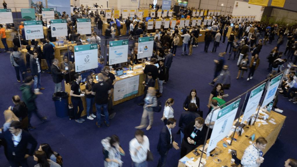 A large crowd of people at the Web Summit convention.
