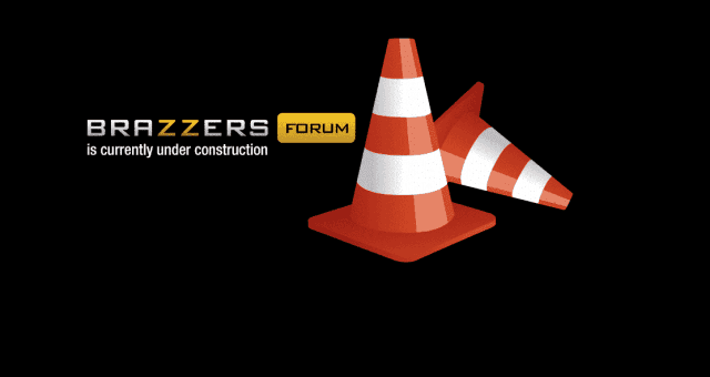 A traffic cone adorned with the controversial word "Brazzers.
