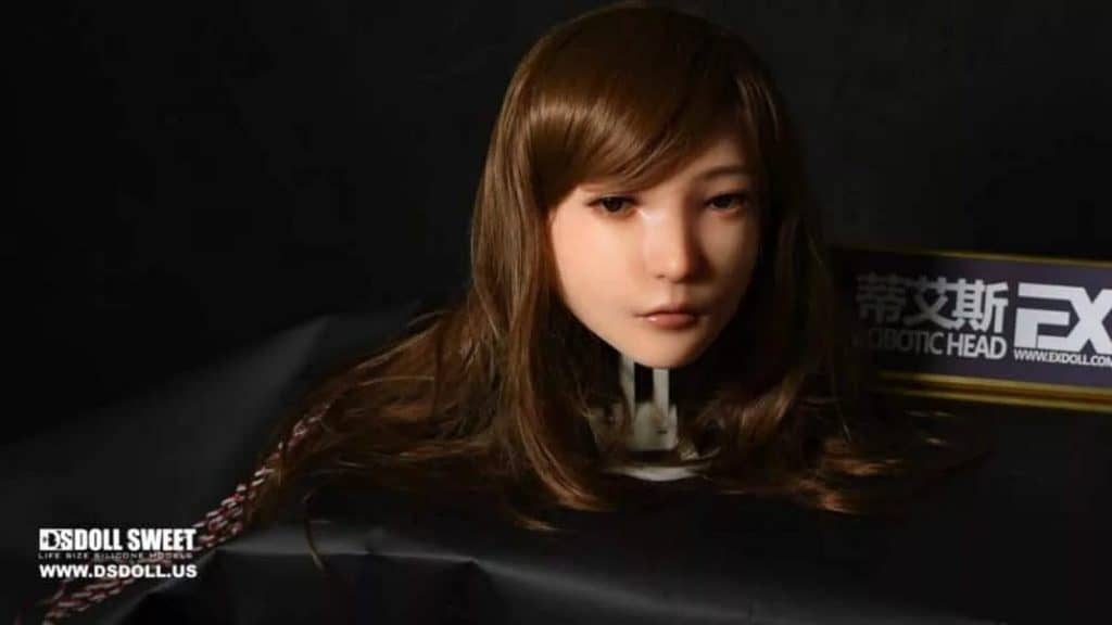 A mannequin with long brown hair on display, now available to reserve.