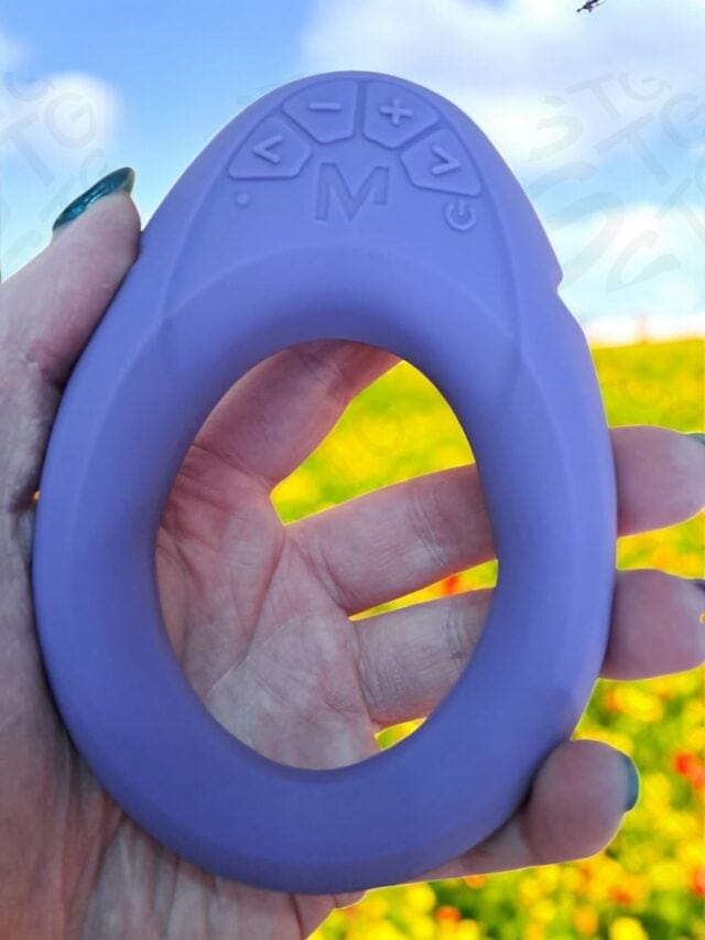 Silicone remote-controlled vibrating ring for couples, designed for pleasure enhancement and intimate play, featuring easy-to-use buttons and waterproof features for versatile use.