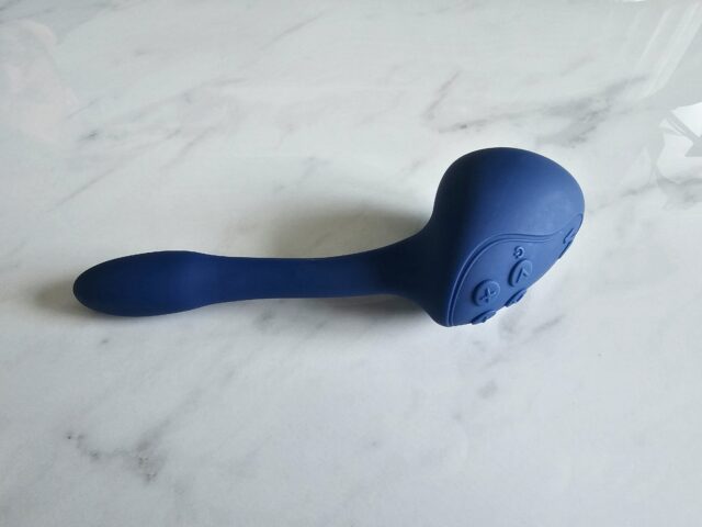 Wireless personal massager with remote control device, designed for intimacy and pleasure, featuring a sleek blue silicone body and user-friendly controls, perfect for enhancing personal wellness.