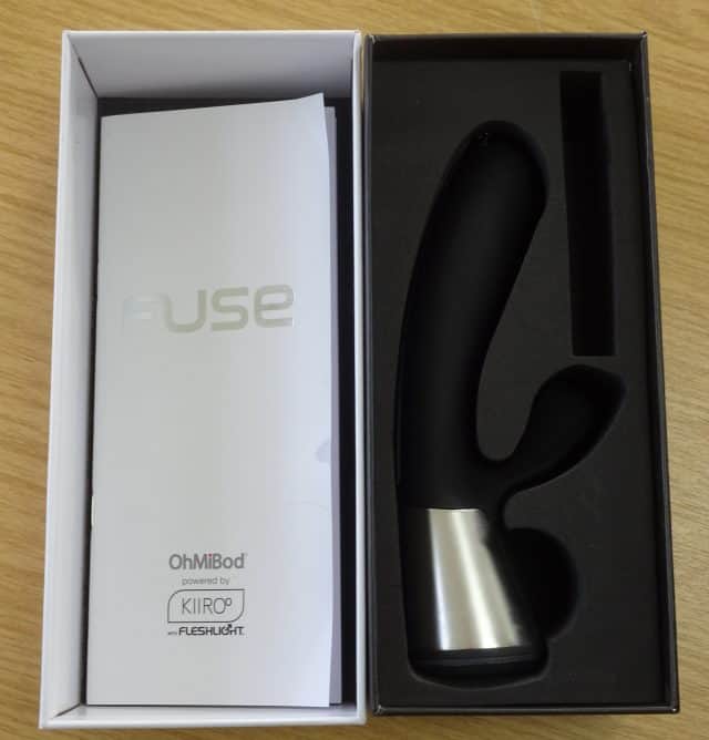 A black and white box containing the OhMiBod Fuse, a sex toy.