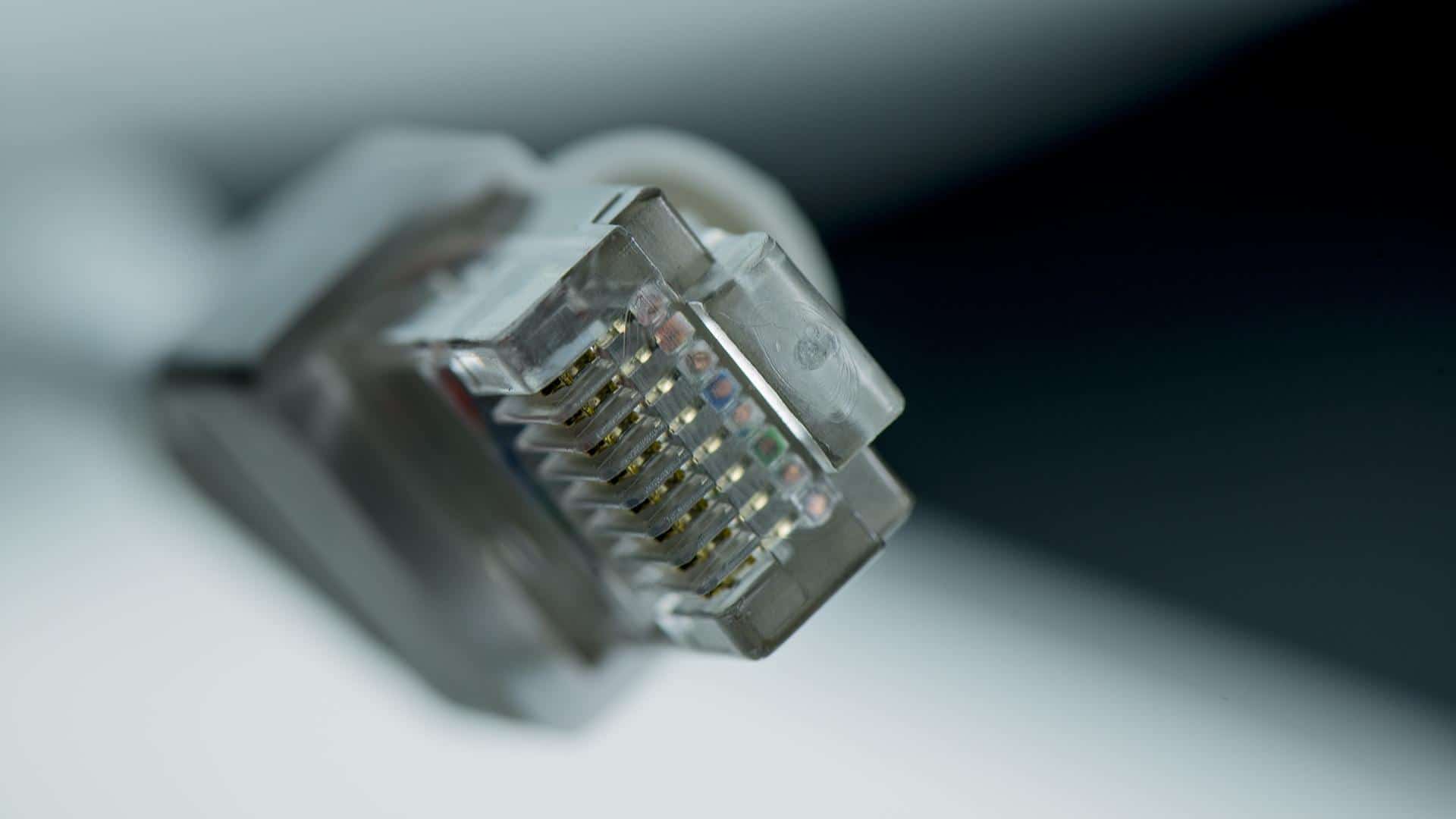 Keywords: ethernet cable

Description: A close-up of an ethernet cable connecting devices for efficient internet connection.