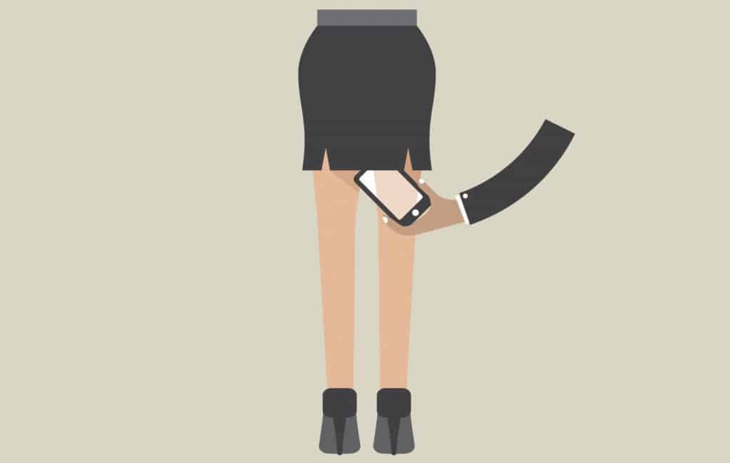 A woman is holding a cell phone in her hand, but will that stop it?