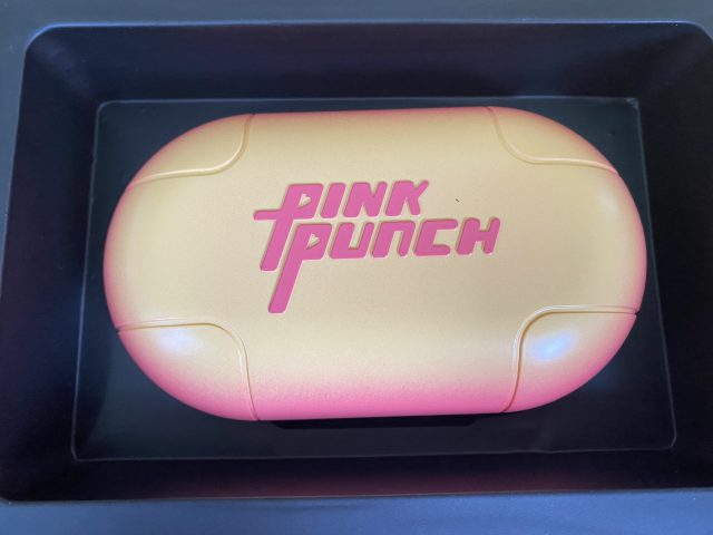 Pink punch airpods case with a touch of sunset mushroom.