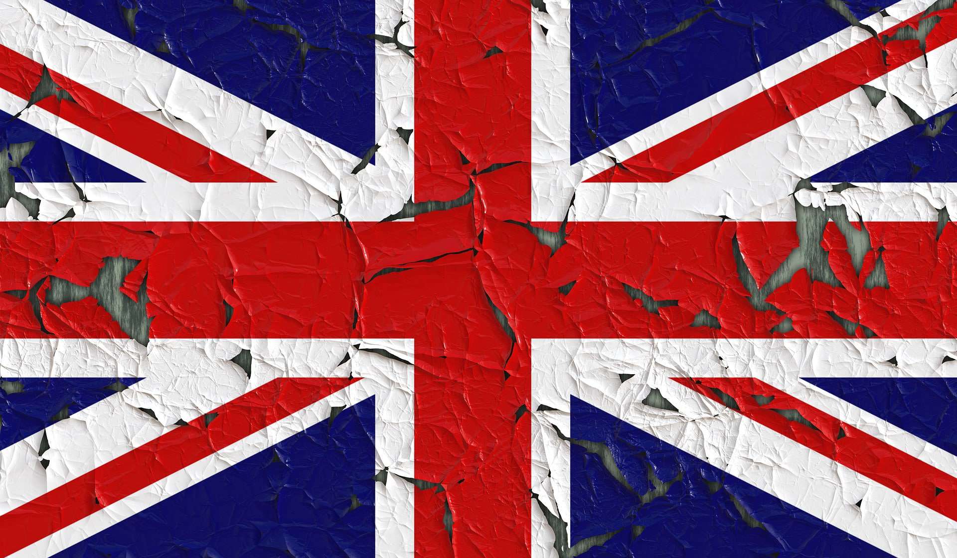 The UK's flag is depicted on a worn surface.